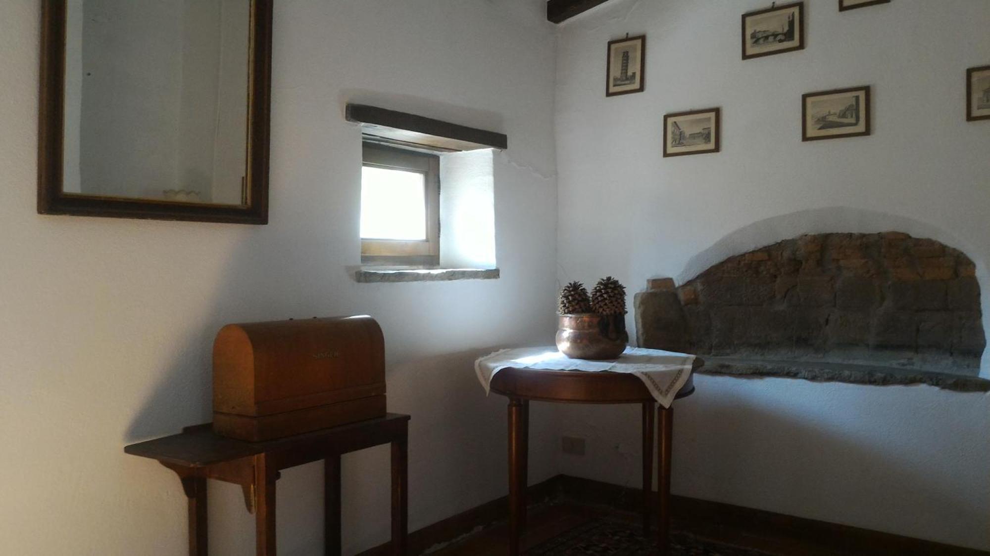 Villa La Nussa Capolona Szoba fotó
