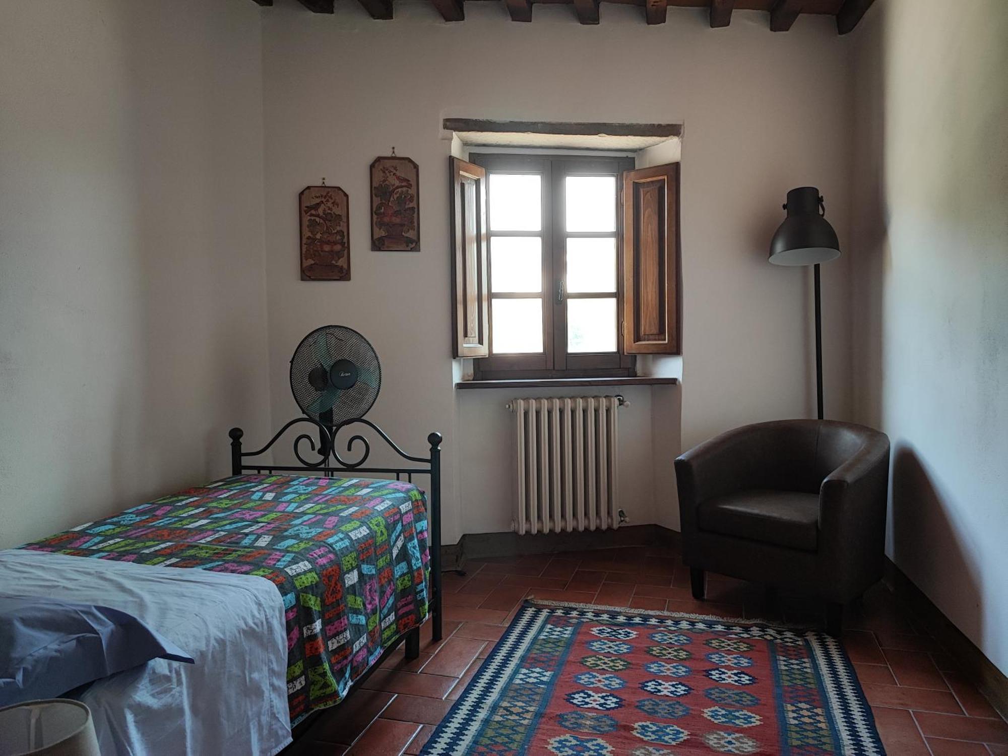 Villa La Nussa Capolona Szoba fotó