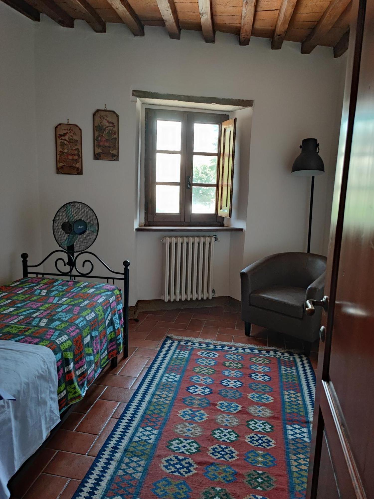 Villa La Nussa Capolona Szoba fotó